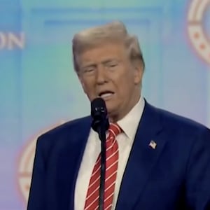 Donald Trump addresses the crowds at an Arizona rally event organized by Turning Point USA.