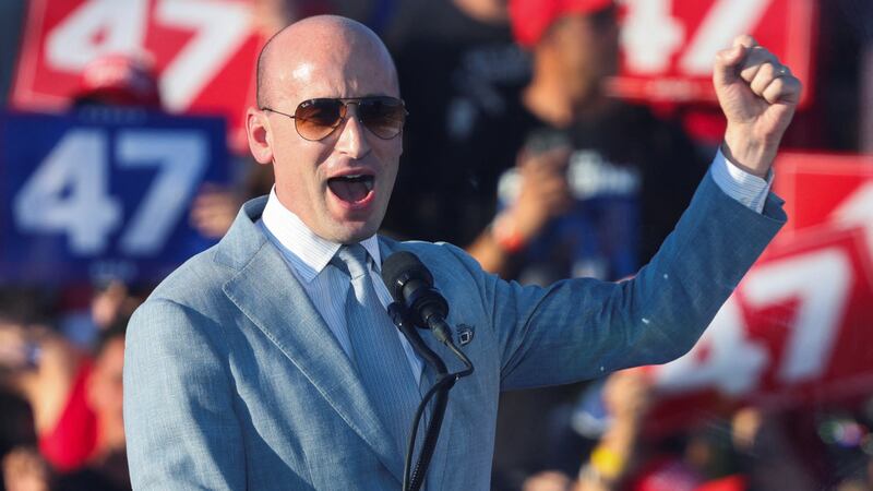 Stephen Miller, Trump's campaign advisor, raises his fist as he speaks during a rally for Republican presidential nominee and former U.S. President Donald Trump, in Coachella, California, U.S., October 12, 2024. 