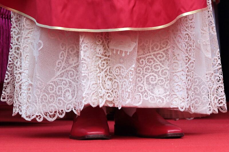 articles/2013/03/01/pope-benedict-s-red-shoes-weren-t-prada/Pope_red_shoes_jr6847