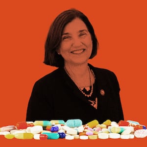 A photo illustration of New Hampshire democratic nominee for governor, Cinde Warmington and a pile of pills.