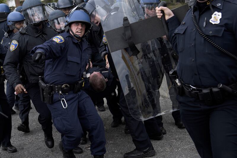 articles/2015/04/29/white-baltimore-gets-troops-black-baltimore-gets-cops-they-hate/150428-baltimore-protests1_atb1dn