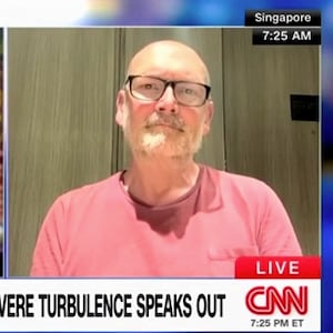 Andrew Davies described to CNN his experience on board a Singapore Airlines flight that experienced severe turbulence.