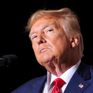 Former U.S. President and Republican presidential candidate Donald Trump pauses as he speaks at a campaign event in Council Bluffs, Iowa, U.S., July 7, 2023