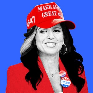 A photo illustration of Tulsi Gabbard wearing a MAGA hat and pro-Trump buttons on her lapel