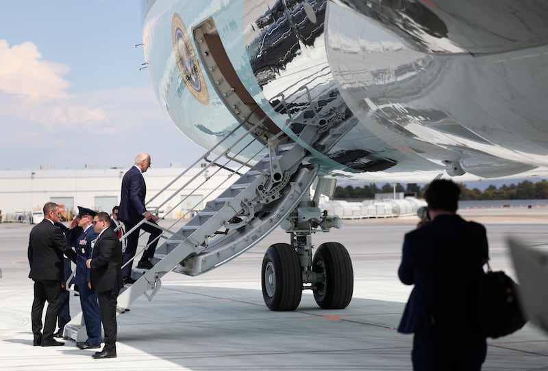 Joe Biden mounts stairs to Air Force One