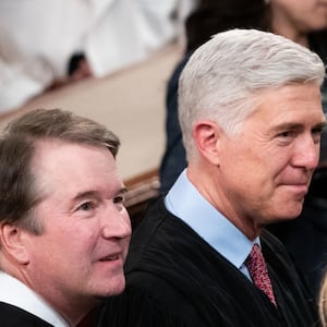 Brett Kavanaugh and Neil Gorsuch stare forward while at the State of the Union.