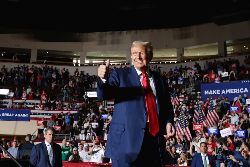 Republican presidential candidate Donald Trump gestures as he holds a campaign rally in Erie, Pennsylvania.