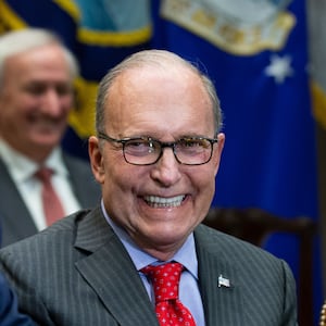 Director of National Economic Council Larry Kudlow smiles as United States President Donald J. Trump speaks with reporters during a meeting with automotive industries executives in the Roosevelt Room of the White House on May 11, 2018 in Washington, DC.