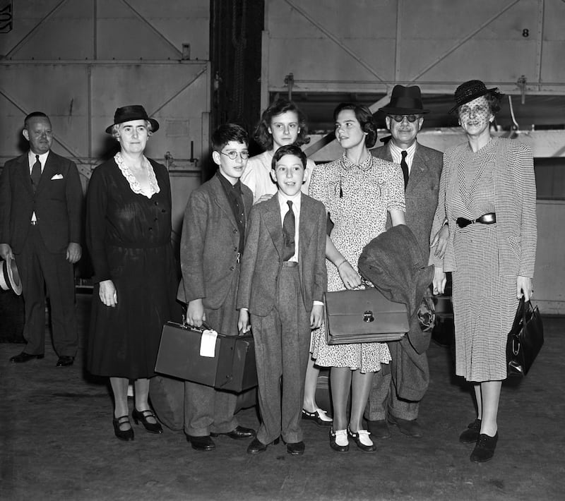 A photograph of Baron Alphonse Rothschild, formerly of Vienna, with his wife and daughters after arriving in New York City as refugees on the British liner Samaria on July 8, 1940.