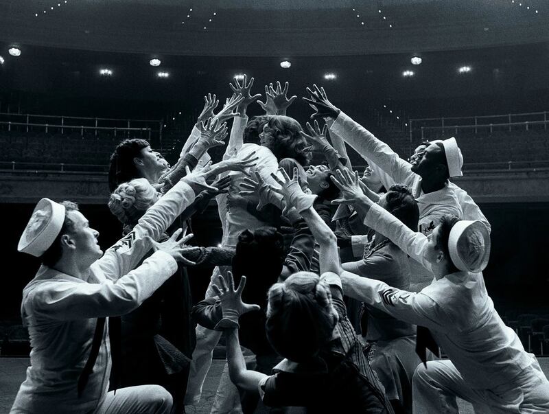 Bradley Cooper and Carey Mulligan dance in a black and white still from ‘Maestro.’