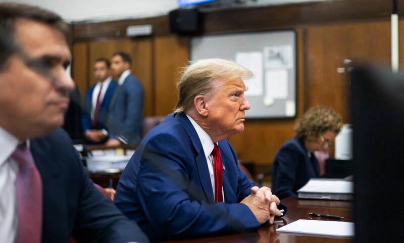 Former U.S. President Donald Trump appears in court during his trial for allegedly covering up hush money payments at Manhattan Criminal Court.