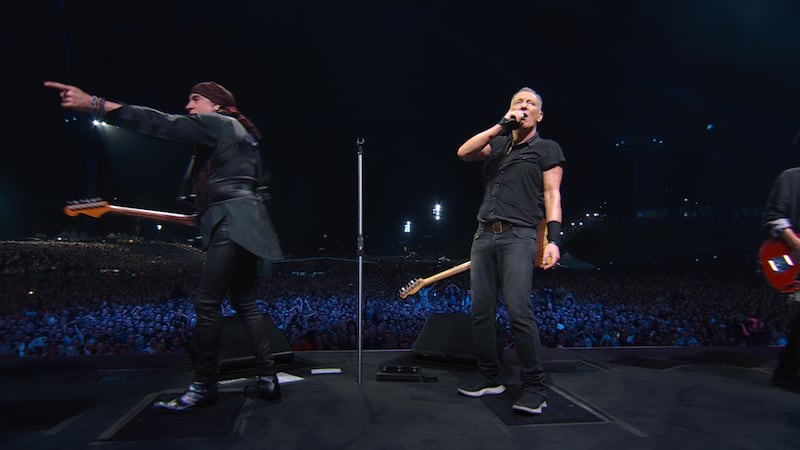 Steven Van Zandt and Bruce Springsteen performing with The E Street Band.