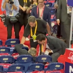 Rudy Giuliani falls onto the convention floor on the second day of the RNC in Milwaukee. 