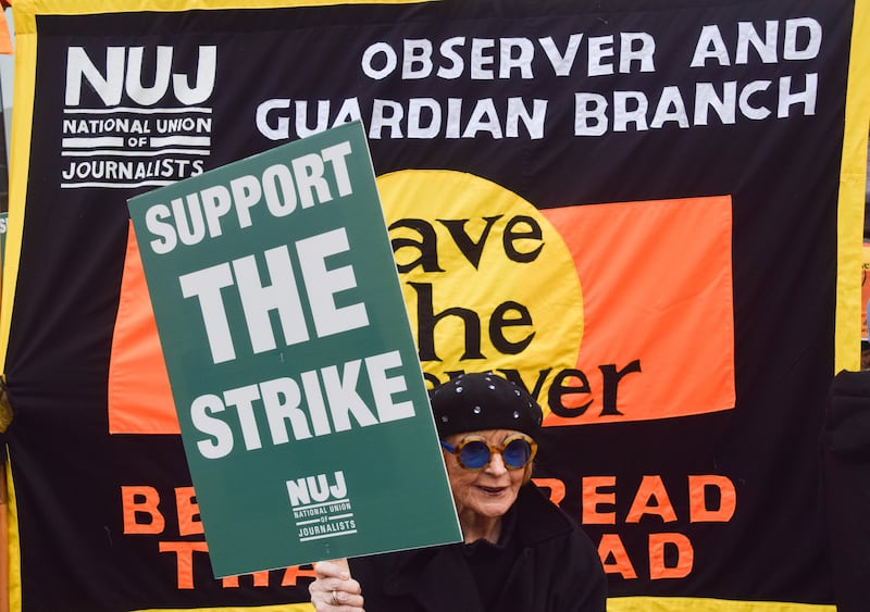 Television personality Anne Robinson holds a placard in support of the strike at the National Union of Journalists (NUJ) picket outside The Guardian offices in King's Cross