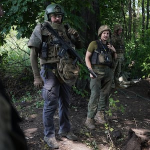 A photo of Ukrainian soldiers of the Bohun brigade near the Russian lines in Lyman, Ukraine.