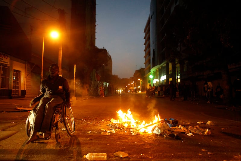 articles/2012/02/25/senegal-presidential-elections-violence-flares-over-wade-s-candidacy/senegal-election-violence-henderson_y22jy8