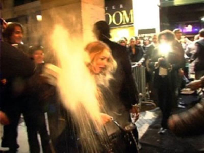 galleries/2012/04/02/kim-kardashian-s-flour-bomb-and-more-peta-ambushes-photos/peta-celebrity-fur-attacks-lindsay-lohan_woqy9s