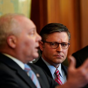 Speaker Mike Johnson (R-LA) and Majority Whip Tom Emmer (R-MN) listen as House Majority Whip Steve Scalise (R-LA) speaks during a press conference about an impeachment inquiry into President Joe Biden.