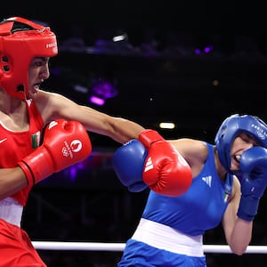 Imane Khelif lands a punch on Angela Carini at the Paris Olympics.