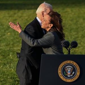 U.S. Vice President Kamala Harris hugs President Joe Biden on the South Lawn at the White House.