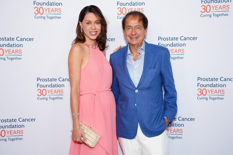 Alina De Almeida and John Paulson