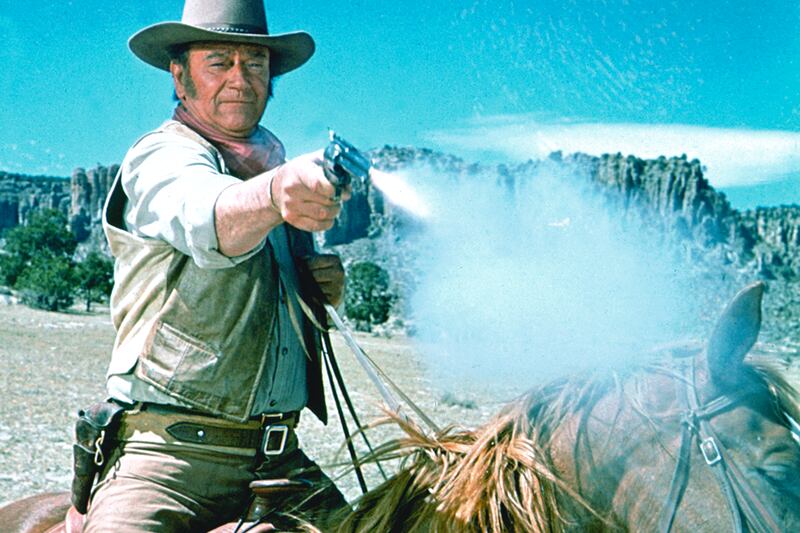 articles/2014/04/06/a-new-biography-shows-that-john-wayne-was-his-own-best-creation/140405-john-wayne-tease_d9mx05