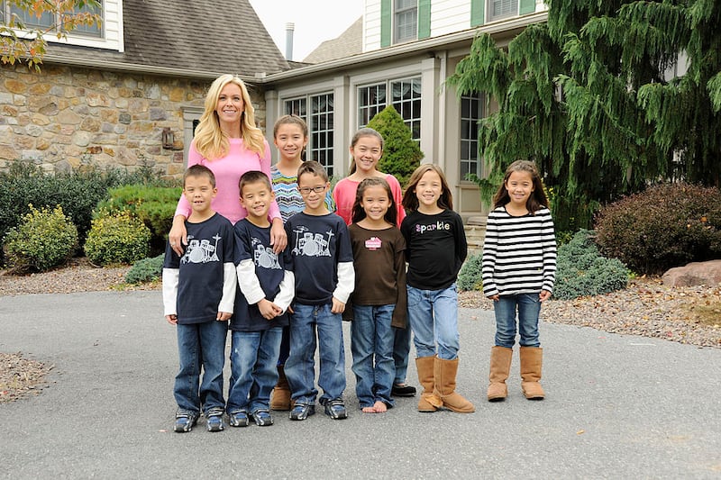 Collin Gosselin, second from left, smiles with his mom, Kate, and his siblings in a 2012 photoshoot.