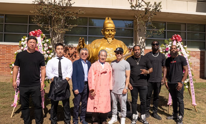 A photograph of royal family members Yi Seok and Andrew Lee at the King Sejong Statue Unveiling on Thursday, October 5, 2023.