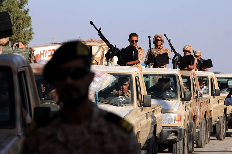 articles/2012/10/22/one-year-later-libya-s-long-road-continues/libya-one-year-later-dettmer_w5eeob