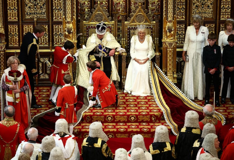 King Charles III sits alongside Britain's Queen Camilla during the State Opening of Parliament, at the Houses of Parliament, in London, on July 17, 2024.