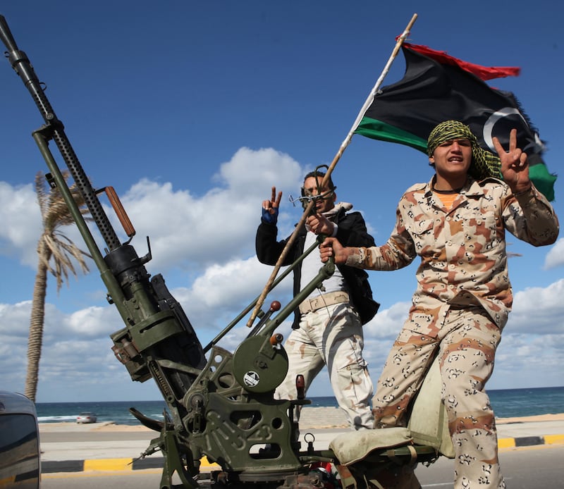 articles/2013/02/25/libyan-government-turns-to-ansar-al-sharia-militia-for-crime-fighting-help/130225-Dettmer-Libya-box_pleq38