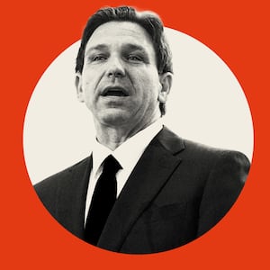 Photo illustration of Governor Ron DeSantis (R-FL) in a white circle centered on a red background.