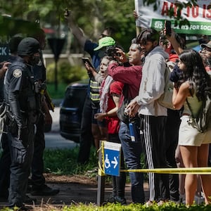 Protesters confront police at Emory University in Atlanta.