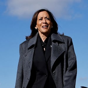 Democratic presidential nominee U.S. Vice President Kamala Harris walks to speak to the media upon her arrival at Dane County Regional Airport in Madison, Wisconsin, U.S., November 1, 2024.