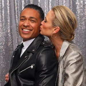 T.J. Holmes, Amy Robach portrait  at the iHeartRadio Jingle Ball