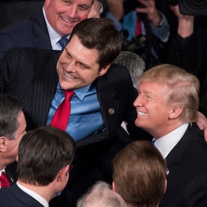 President Donald Trump takes a selfie with Rep. Matt Gaetz after the State of the Union address in 2018.