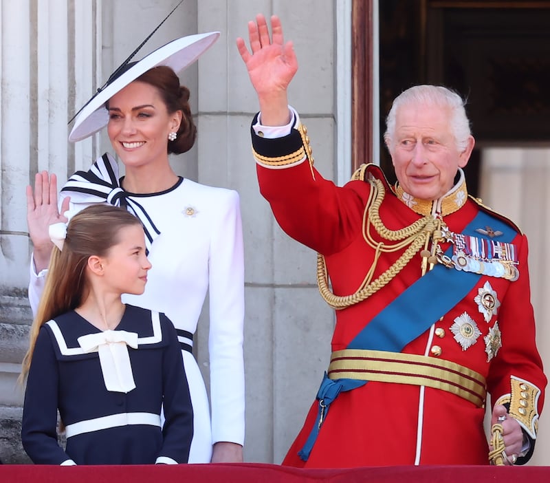 Catherine, Princess of Wales, Princess Charlotte of Wales and King Charles III during Trooping the Colour at Buckingham Palace on June 15, 2024.