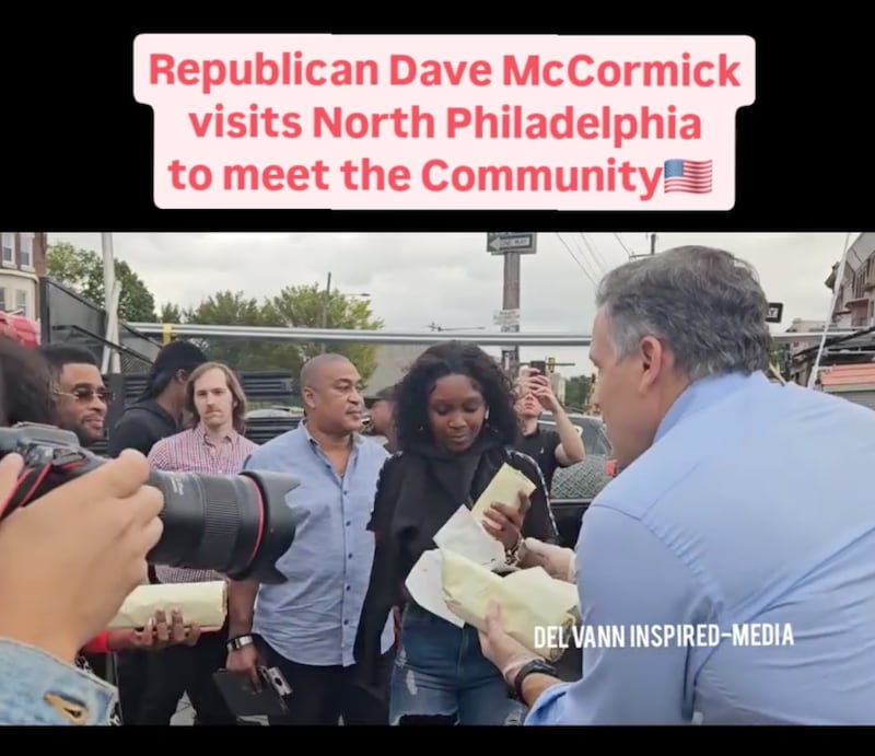 GOP Senate candidate Dave McCormick hands out sandwiches outside Max’s Steaks.