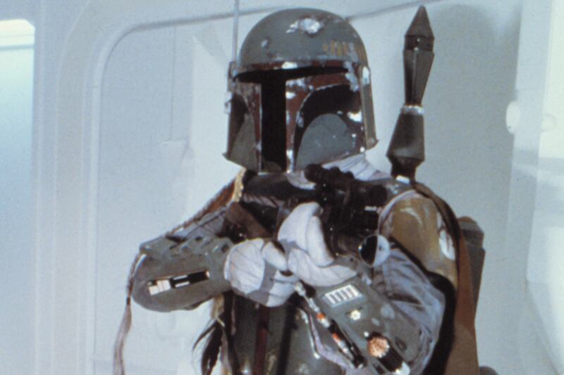 articles/2014/06/05/the-cult-of-boba-fett-the-star-wars-bounty-hunter-s-spin-off/140605-goldstien-fett-tease_bsieob