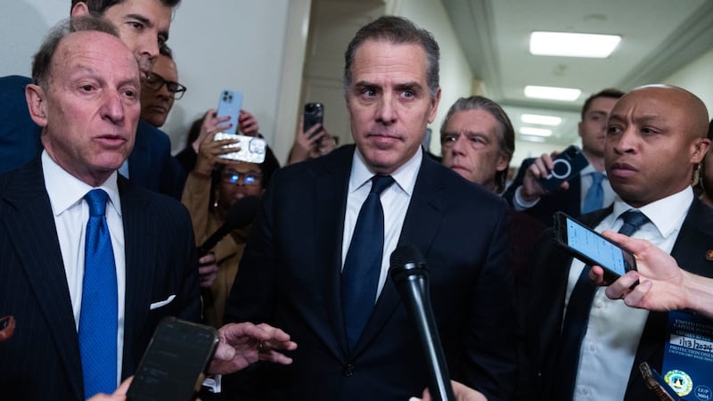 Hunter Biden, center, and his attorney Abbe Lowell, left, address the media after leaving the House Oversight and Accountability Committee markup in Rayburn Building on Wednesday, January 10, 2024.