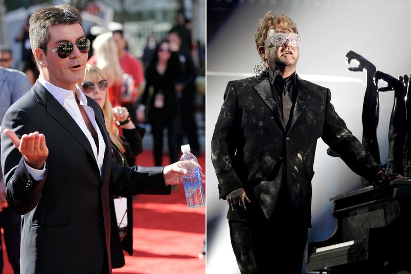 galleries/2012/01/25/elton-john-s-biggest-cat-fights-from-madonna-to-simon-cowell-photos/elton-feuds-cowell_fjauqn