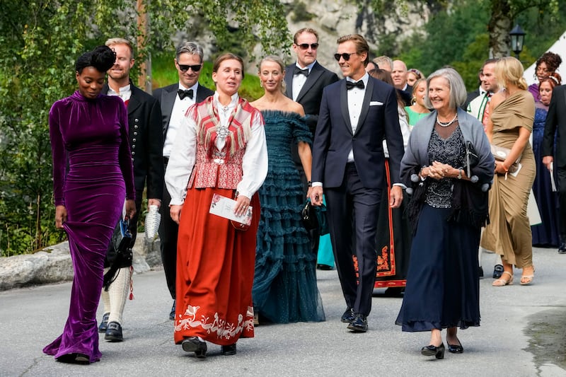 Guests arrive for the wedding ceremony of Princess Martha Louise of Norway and Durek Verrett in Geiranger on Aug. 31, 2024