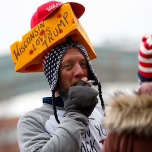 An attendee waits in line to attend a rally held by President Donald Trump.