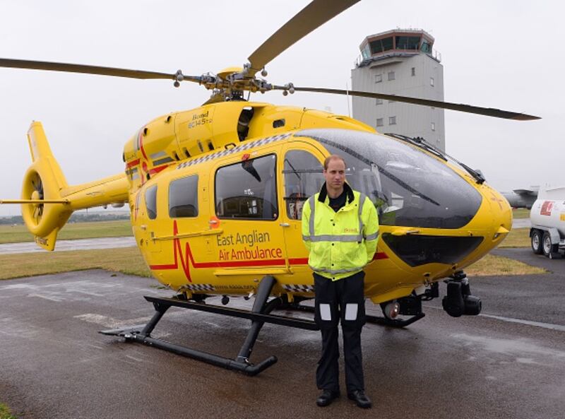 Prince William, as he begins his new job with the East Anglian Air Ambulance (EAAA) at Cambridge Airport on July 13, 2015 in Cambridge, England.