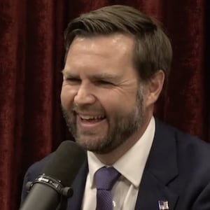 J.D. Vance laughs while on Joe Rogan’s podcast.