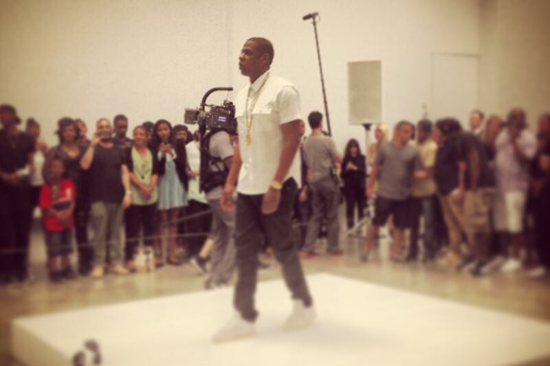 articles/2013/07/11/jay-z-takes-on-the-art-world-with-six-hour-picasso-baby-performance/130710-wilkinson-jayzgallery2-tease_sk4l0h