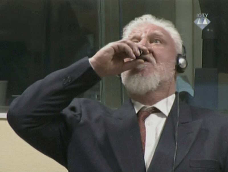 Slobodan Praljak taking poison in the dock