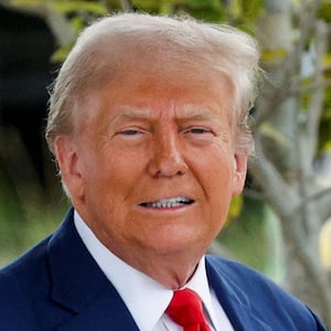 Republican presidential candidate and former U.S. President Donald Trump looks on as he leaves, after casting his ballot for early voting in Florida's primary election, in West Palm Beach, Florida, U.S. August 14, 2024.  