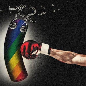 A boxing glove punches and breaks a rainbow-themed punching bag