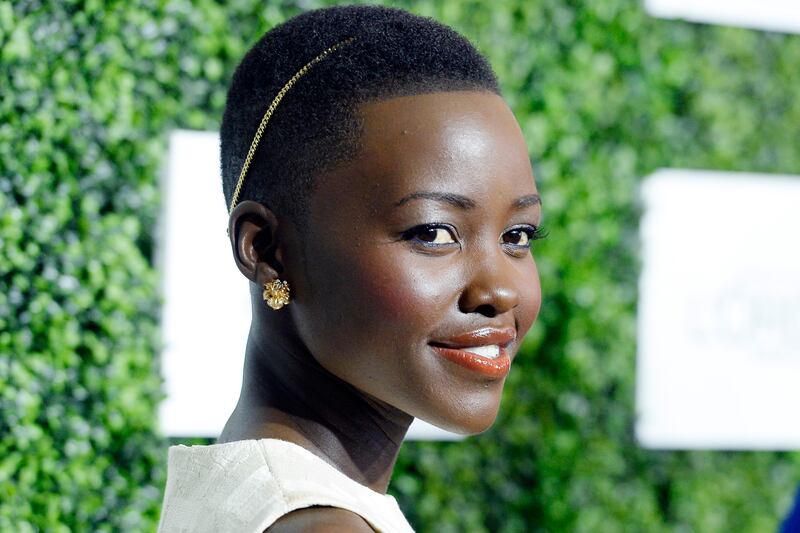 articles/2014/05/29/lupita-nyong-o-s-acceptable-blackness-and-the-myth-of-a-post-racial-hollywood/140527-rawiya-lupita-tease_tjmchu